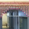 Festive Doorway Toran handcrafted with golden embroidery